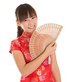 Chinese cheongsam girl with fan