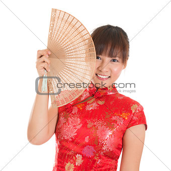 Chinese cheongsam woman with fan
