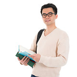 Asian adult student with books