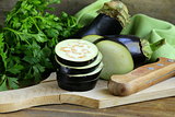 organic vegetables eggplant on a wooden chopping board