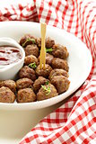 meatballs - traditional meat dish with sauce and herbs