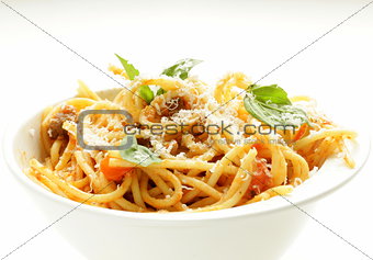 spaghetti pasta with tomato sauce, basil and parmesan cheese