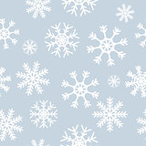 White snowflakes on gray background
