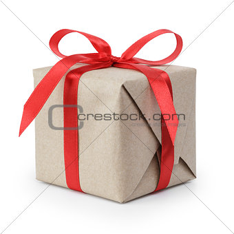 small gift box wraped in recycled paper with ribbon bow