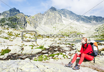 woman backpacker at Five Spis Tarns, Vysoke Tatry (High Tatras),