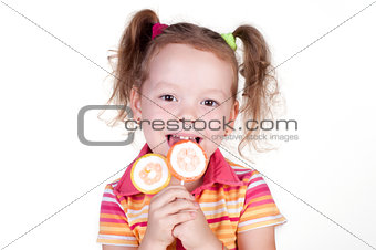 Cute fun little girl holding lolly pop 
