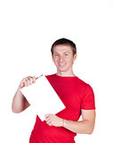 Man in a red shirt smiles and shows a white card