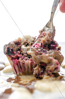 Eating a berry muffin