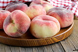 fig peaches sweet and ripe on a wooden table