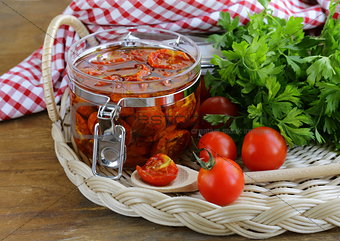 sun-dried tomatoes with herbs and olive oil in the pot