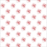 Seamless pattern with red spiral curls.