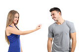 Woman gesturing beckoning to a man