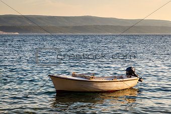 Lonely Boat and Island Brac at Sunset, Dalmatia, Croatia