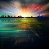 abstract background with silhouette of city and sunrise
