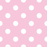 Seamless vector pattern with big white polka dots on a pastel pink background.