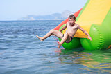 Boy On Water Slide