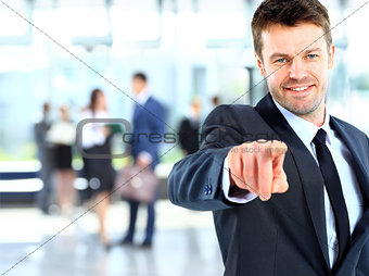 business man pointing at you