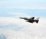 Jet fighter at altitude