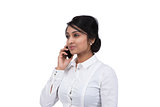 Side view of an Asian businesswoman talking on cell phone