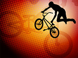 bmx stunt cyclist silhouette on the abstract background