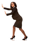 business woman pushing invisible object