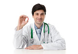 doctor shows a pill