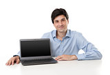 handsome young businessman displaying laptop