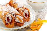 Cannoli with fresh ricotta and candied fruit.