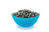 Fresh blueberries in a blue bowl