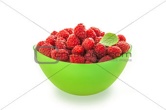 Raspberries in a green bowl