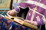 priest with Bible