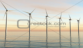 Wind generators at sunset