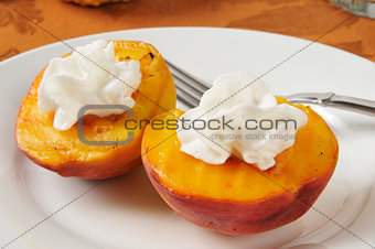 Grilled peaches with whipped cream