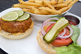 Crabcake Burger with French Fries Closeup