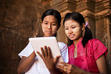 Myanmar girl using digital tablet pc 