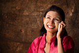 Myanmar girl using smart phone.