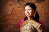 Traditional Myanmar girl looking away.