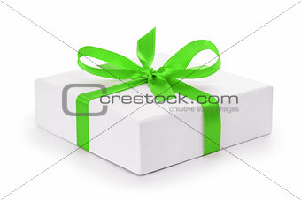 white textured gift box with green ribbon bow