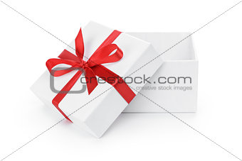 open white textured gift box with red ribbon bow
