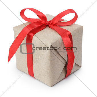 small gift box wraped in recycled paper with ribbon bow