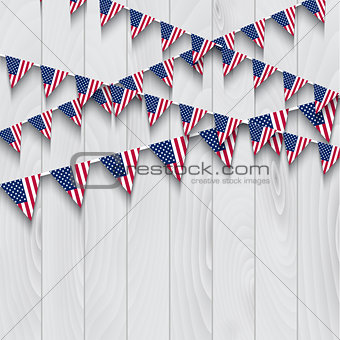 Flag bunting on wooden background