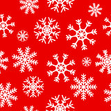 White snowflakes on red background