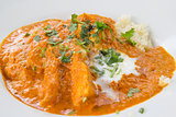 East Indian Butter Chicken Curry with Naan Closeup