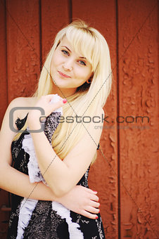 outside portrait of a  blond hair young girl
