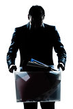 silhouette man portrait carrying heavy box