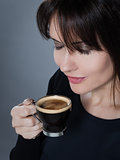woman drinking coffee