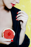 Beautiful Woman Portrait Showing grapefruit breast
