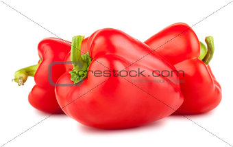 Three red sweet peppers 