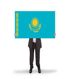 Businessman holding a big card, flag of Kazakhstan