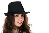 portrait of a beautiful brunette in a hat